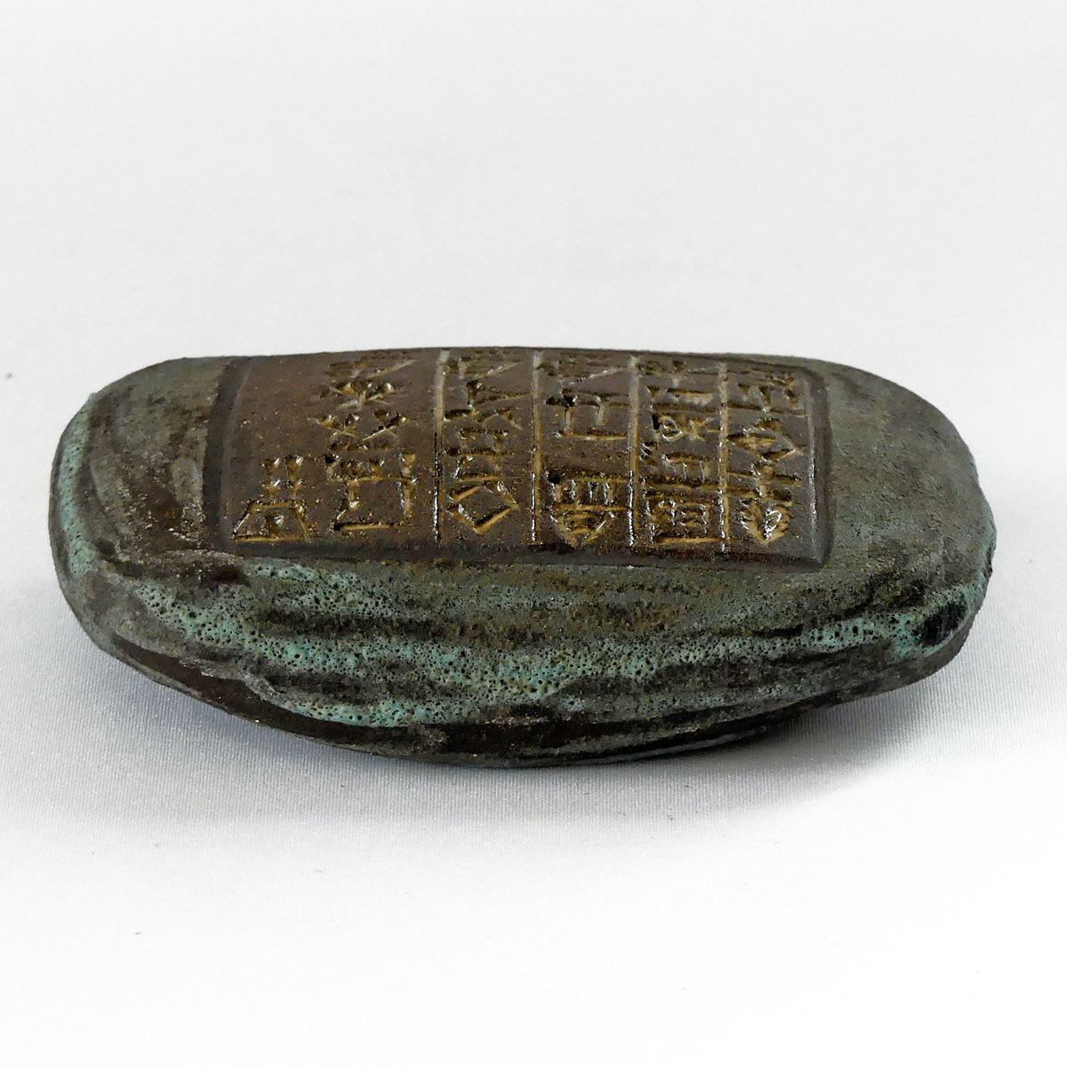 Céramique poids écritures cunéiformes
